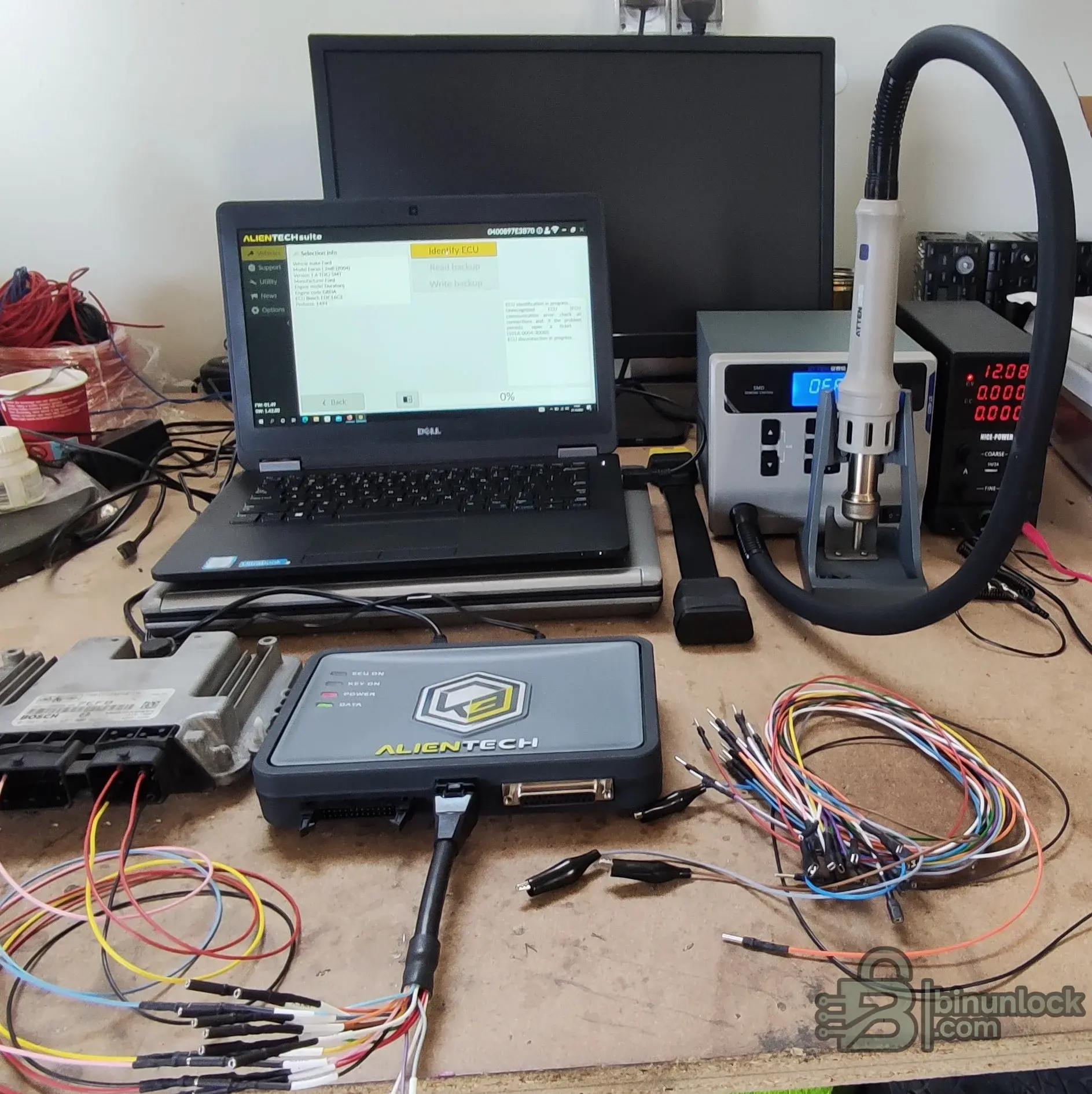 Opened ECU board connected for Boot mode programming with KESS3 and bench wiring.